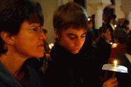 Therese and Peter reflect under candlelight the celebration of Easter